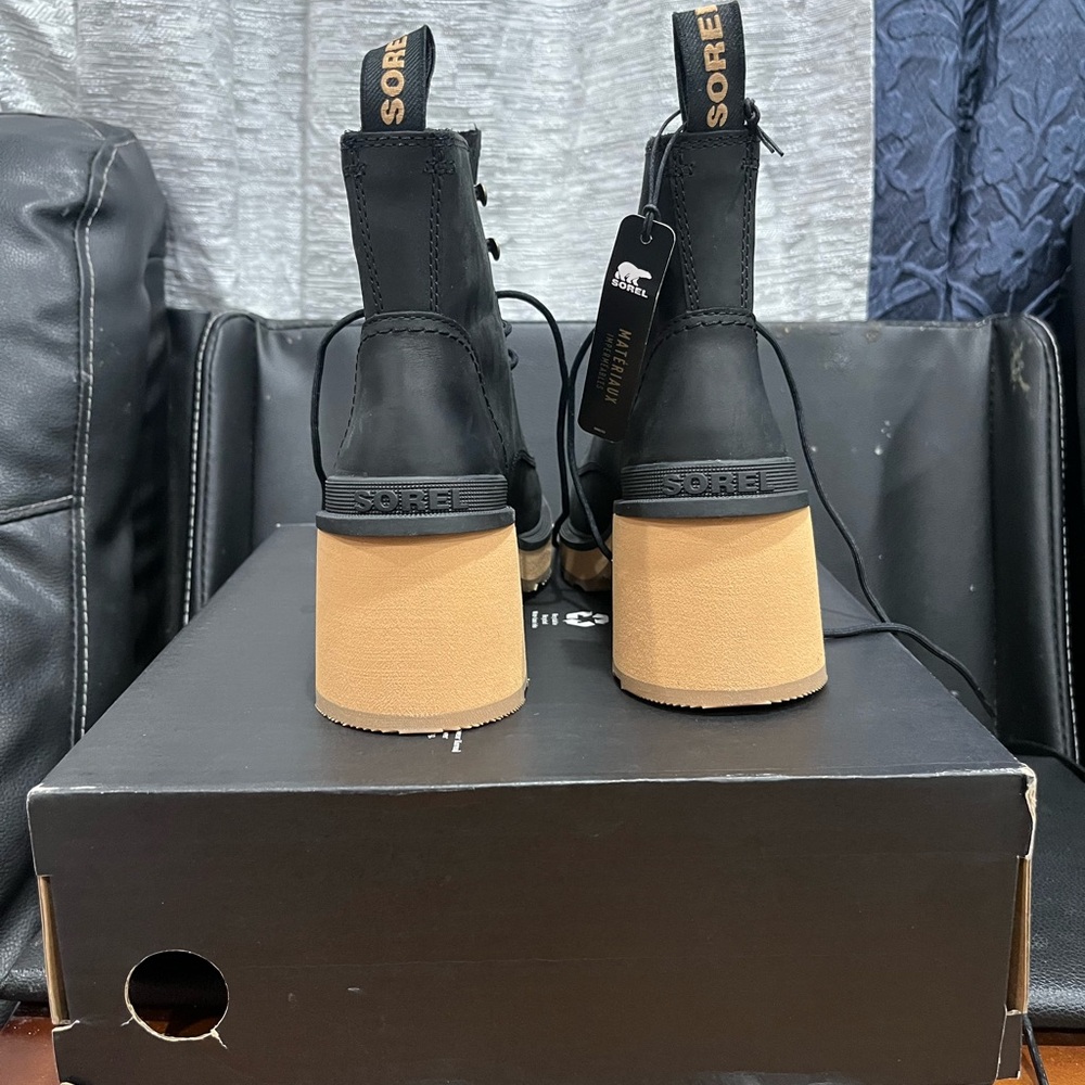 Sorel Black and Tan High-Top Boots